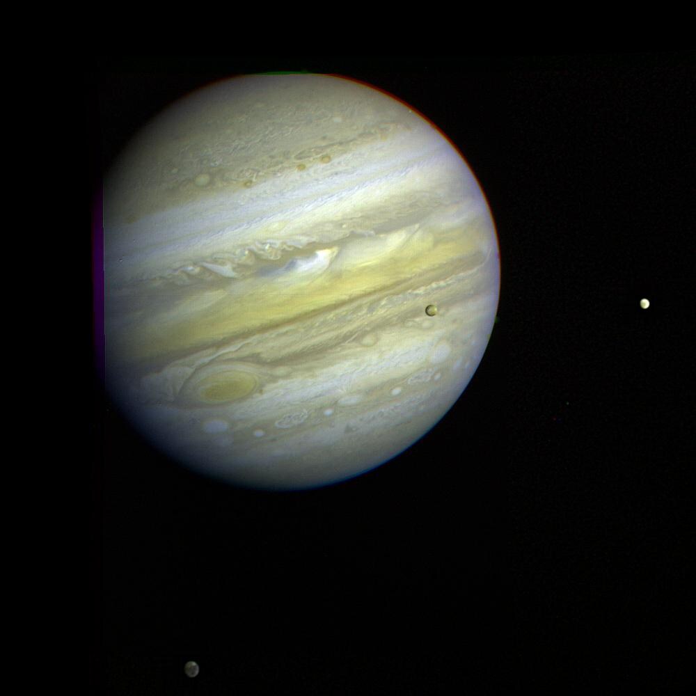 Jupiter and three satellites.