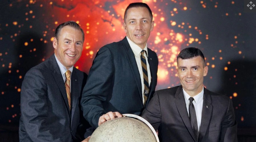 Jim Lovell (left), Jack Swigert, and Fred Haise pose for their official portrait. 